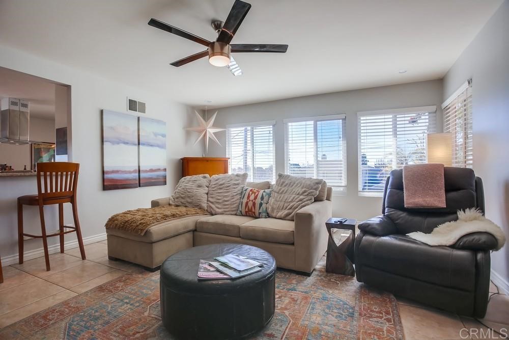 328 Hilmen Drive Solana Beach, CA 92075 - Photo 9 of 19 a living room with furniture and a large window