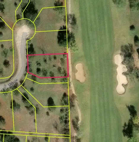 a bathroom with a shower and mirror