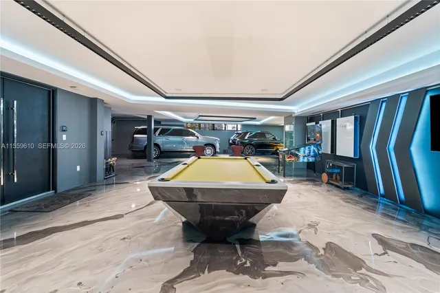 a kitchen with stainless steel appliances granite countertop a sink and a stove