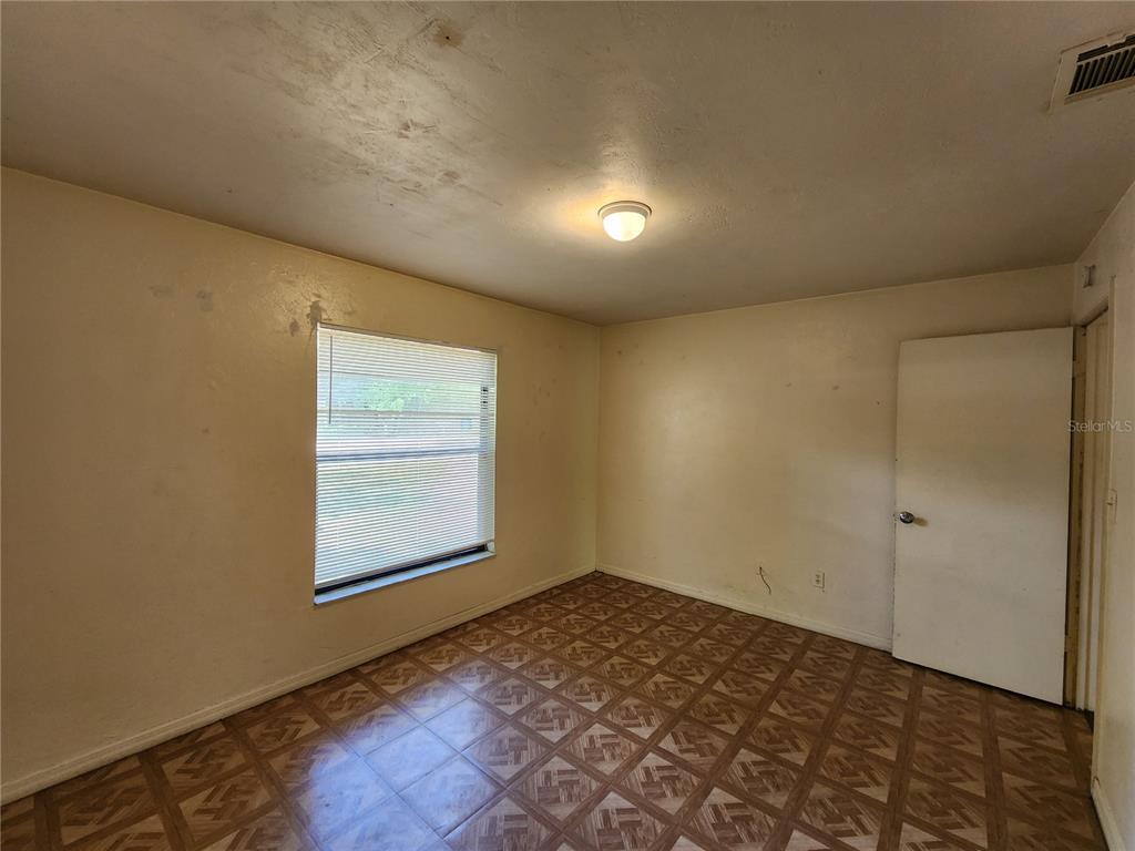 4021 Southwest 37 Street, Unit C Gainesville, FL 32608 - Photo 16 of 25 a view of an empty room and window