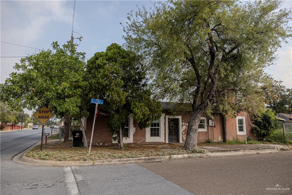 217 South Bridge Avenue Weslaco, TX 78596 - Photo 1 of 7 a view of a house with a tree