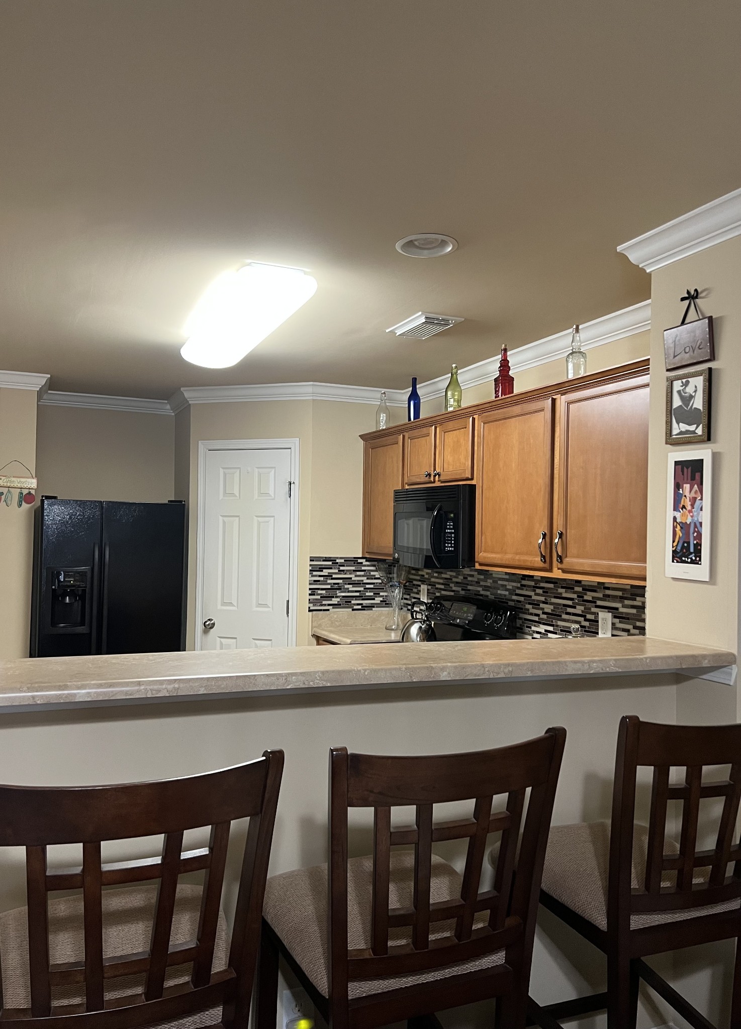 1382 Rural Hill Road, Unit 189 Antioch, TN 37013 - Photo 4 of 16 a kitchen with a table and chairs in it
