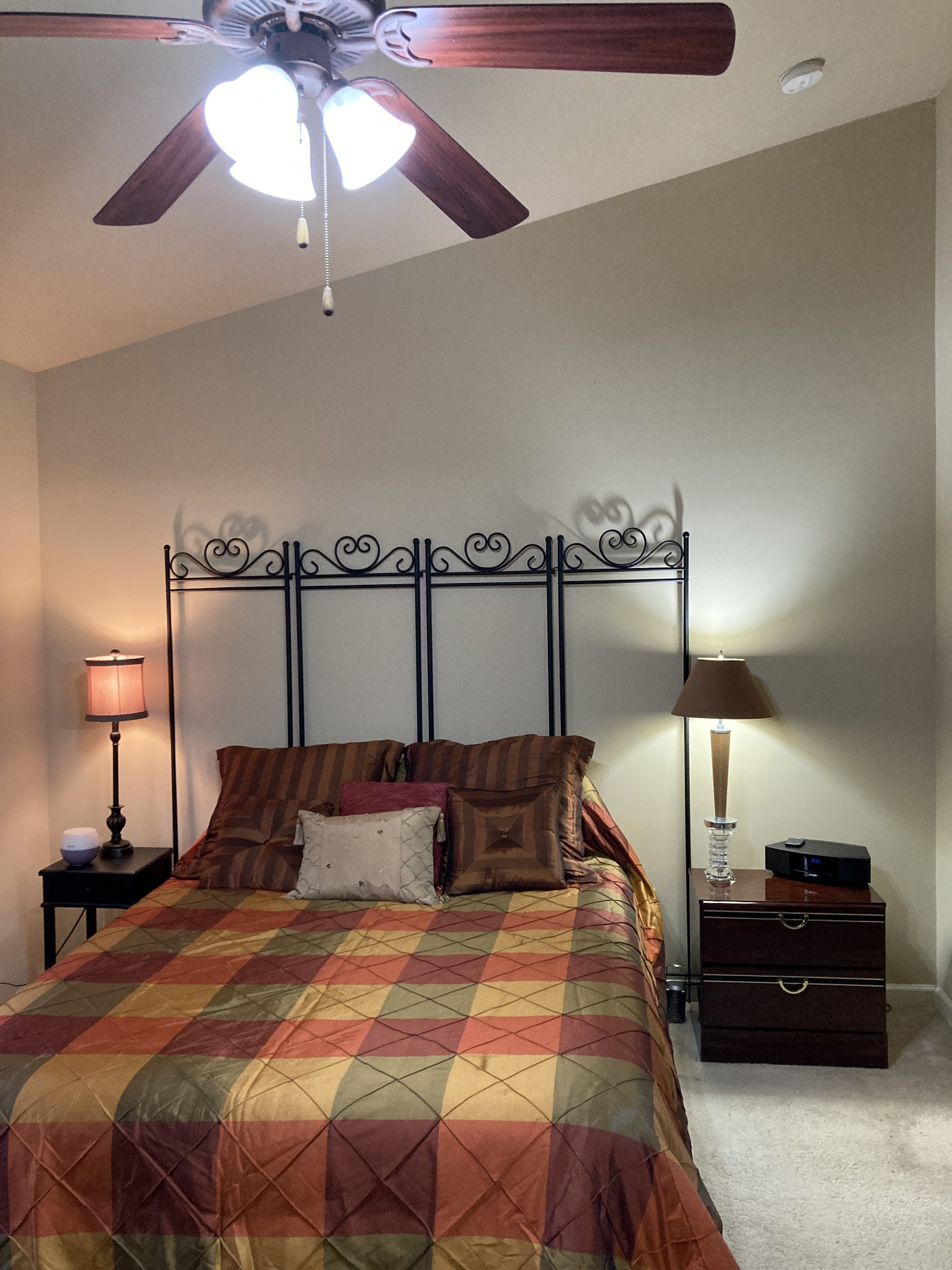 1382 Rural Hill Road, Unit 189 Antioch, TN 37013 - Photo 7 of 16 a bedroom with a bed and a lamp