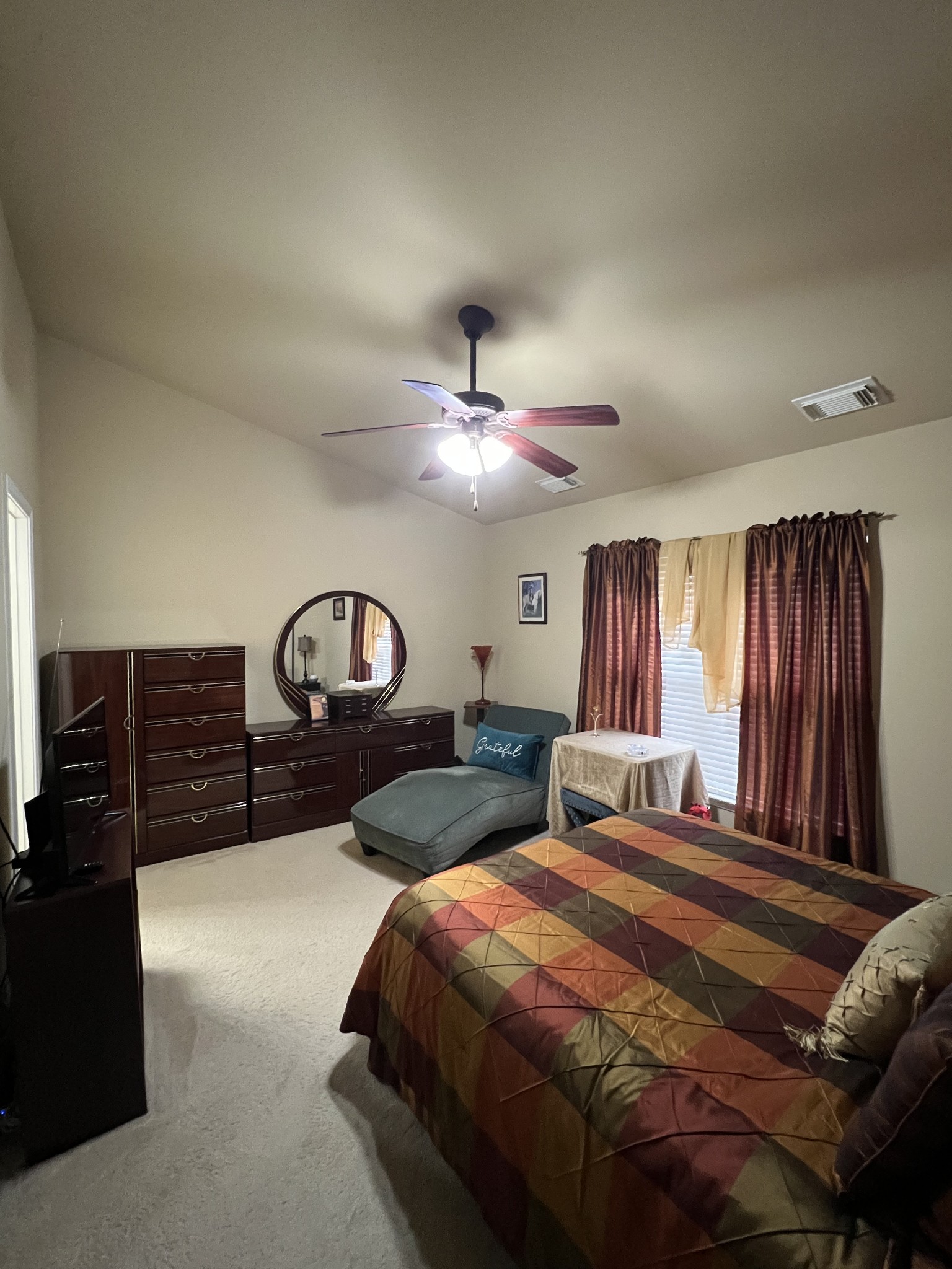 1382 Rural Hill Road, Unit 189 Antioch, TN 37013 - Photo 8 of 16 a bed room with a bed and a chandelier