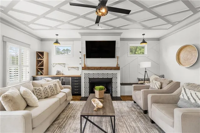 a kitchen with sink a potted plant and cabinets