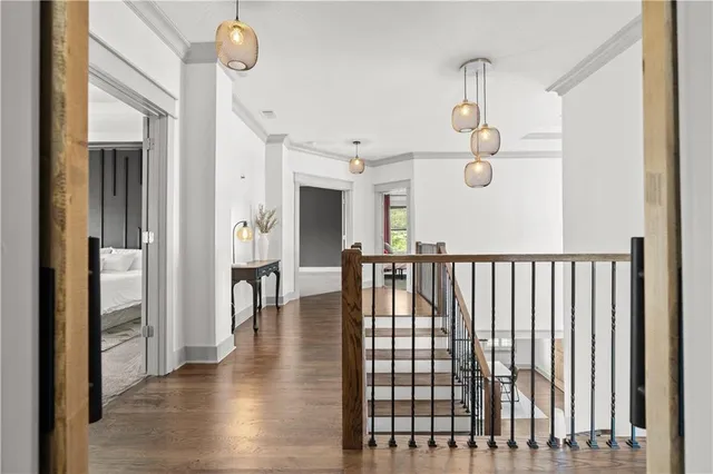 a bathroom with a granite countertop double vanity sink and a mirror