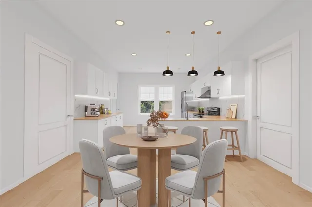 an aerial view of residential house with outdoor space and swimming pool