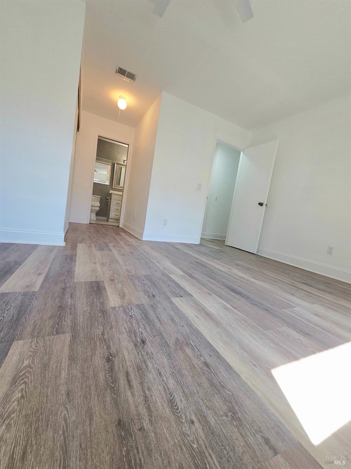 140 Del Rio Court, Unit 4 Vacaville, CA 95687 - Photo 16 of 25 a view of a livingroom with wooden floor