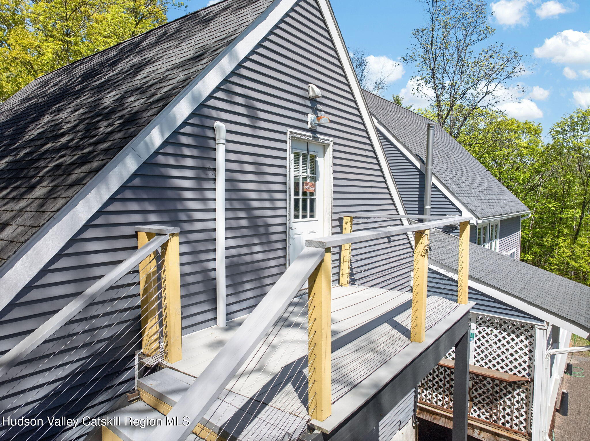 322 Morrison Road Acra, NY 12405 - Photo 33 of 49 a view of a balcony with wooden floor and stairs