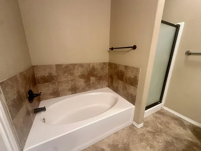 a bathroom with a bathtub