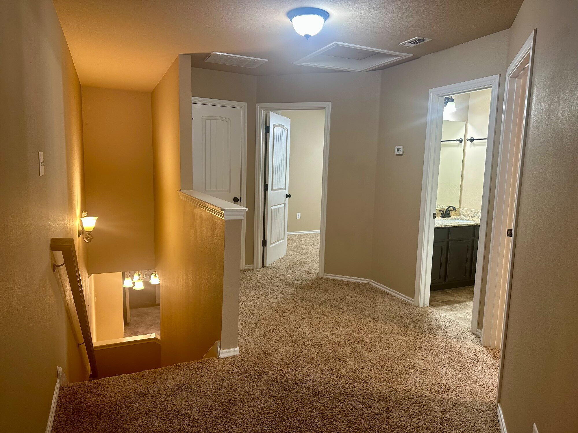 4423 106th Street, Unit A Lubbock, TX 79424 - Photo 17 of 23 a view of a hallway with some area