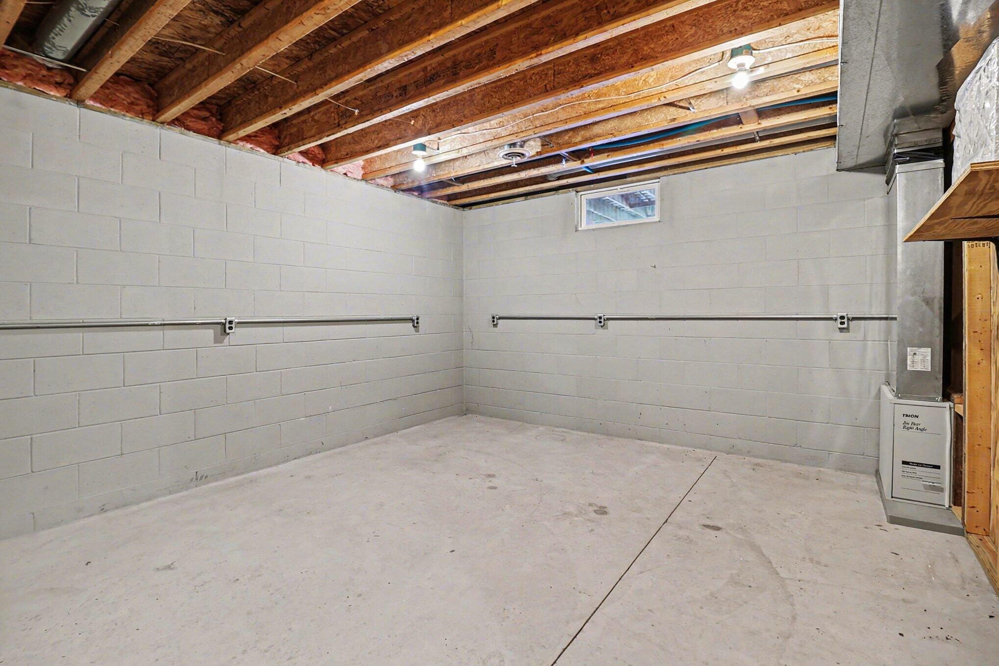 1051 West White Road Free Soil, MI 49411 - Photo 24 of 48 Multiple Basement Rooms for Storage