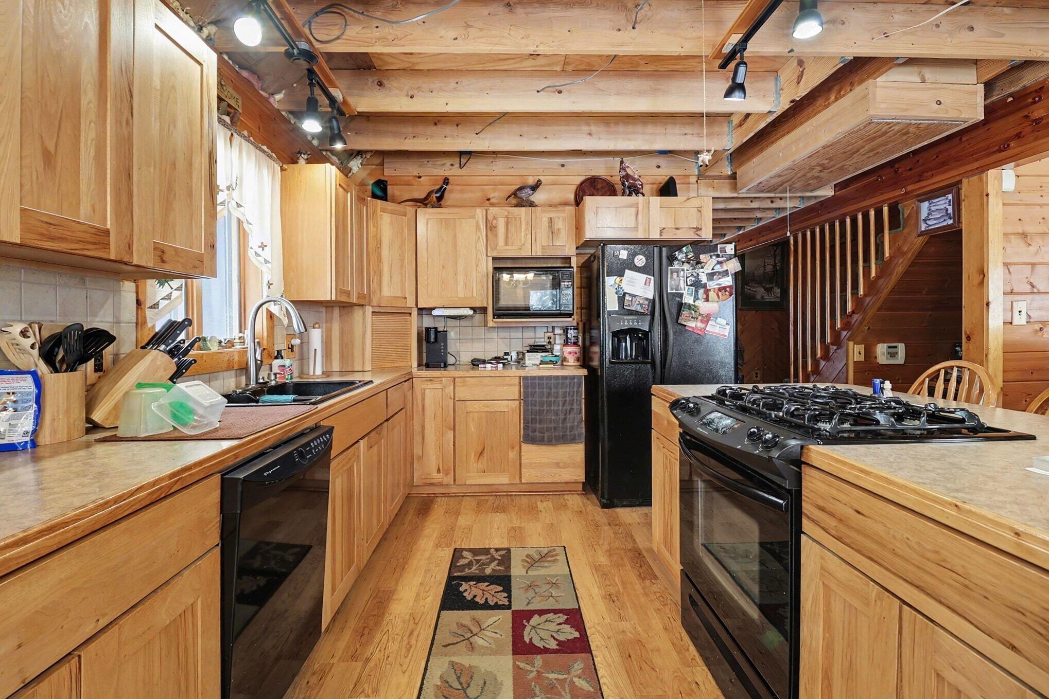 1051 West White Road Free Soil, MI 49411 - Photo 10 of 48 Beautiful Hickory Cabinets