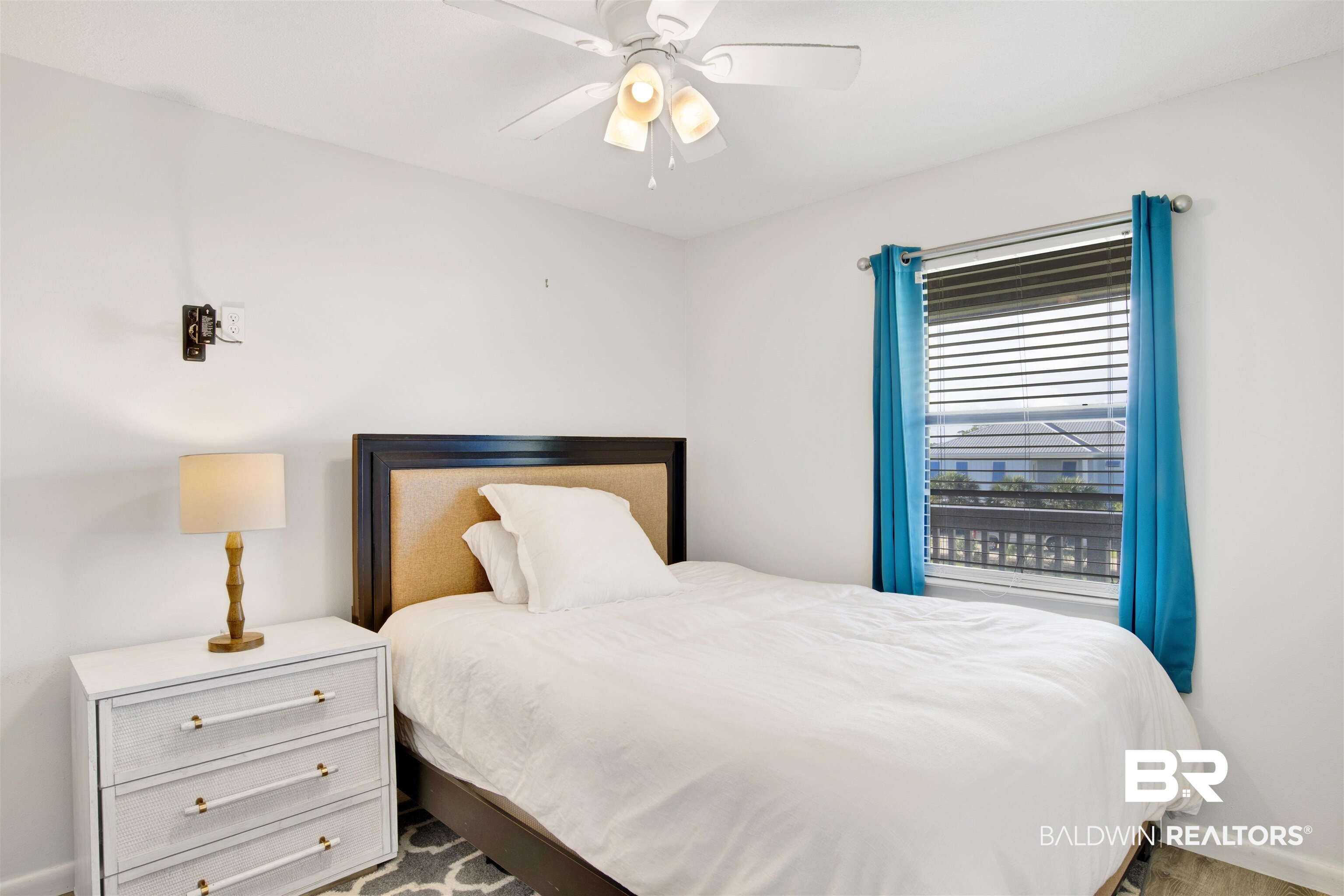 26913 Marina Road, Unit 213 Orange Beach, AL 36561 - Photo 16 of 30 Bedroom featuring ceiling fan