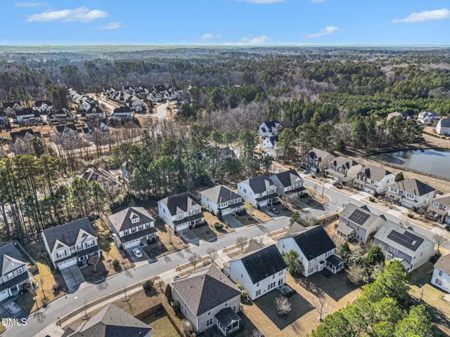 an aerial view of a city with lots of residential buildings