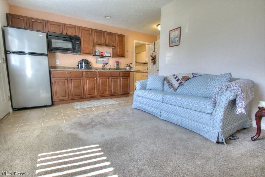 7730 Chillicothe Road Mentor, OH 44060 - Photo 31 of 35 In law suite living room and kitchen