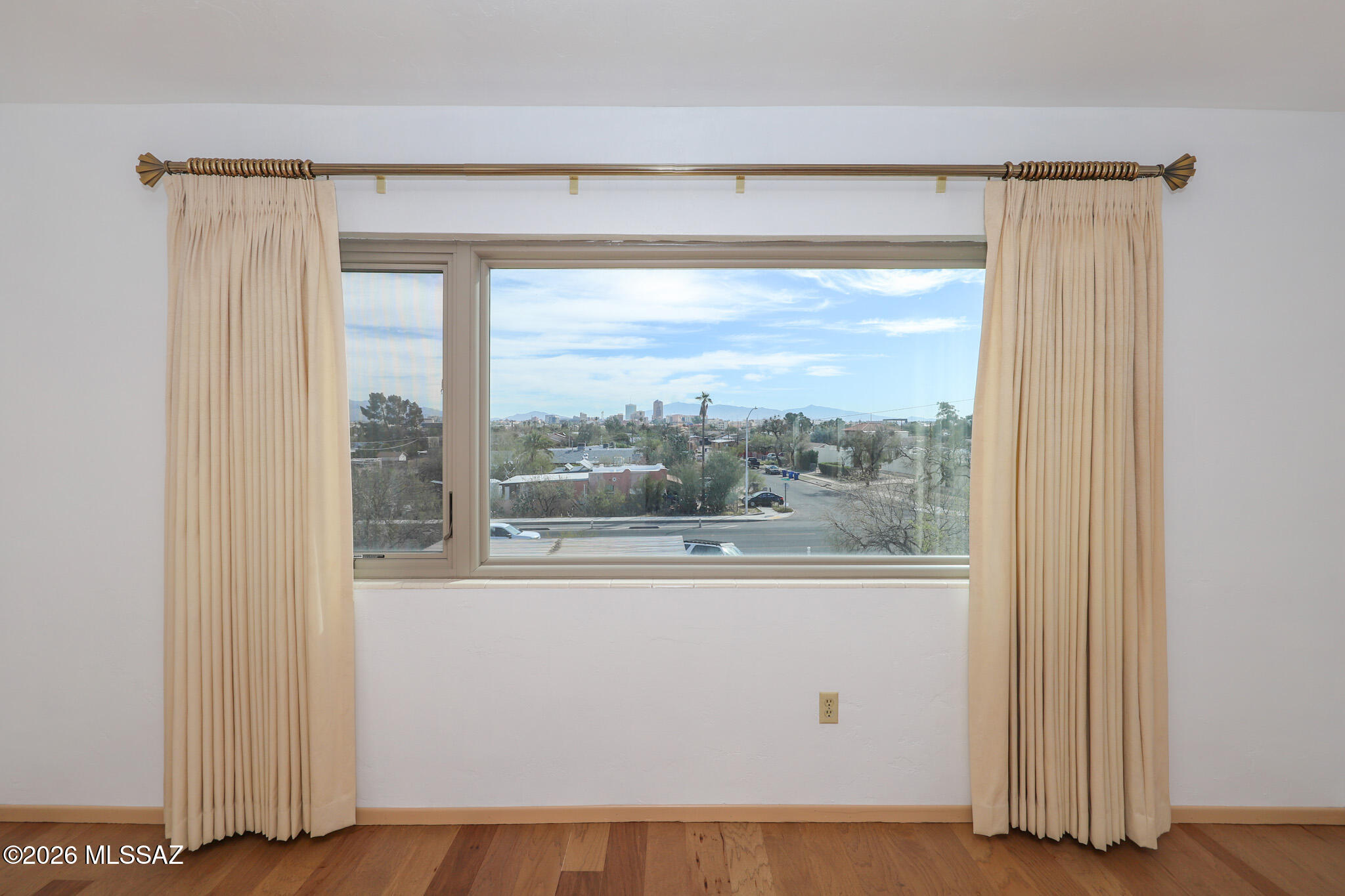 37 North Silverbell Road Tucson, AZ 85745 - Photo 14 of 31 a view of a room that has a large window