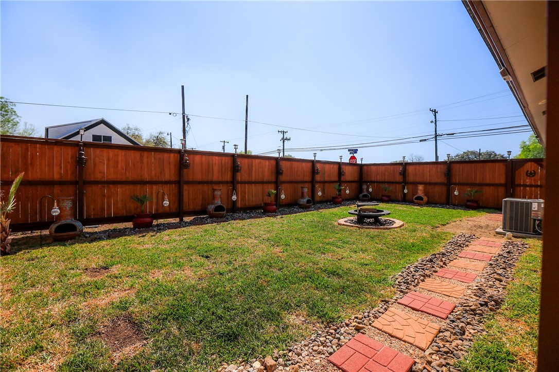 700 North Cameron Street Alice, TX 78332 - Photo 14 of 17 a view of a backyard with sitting area