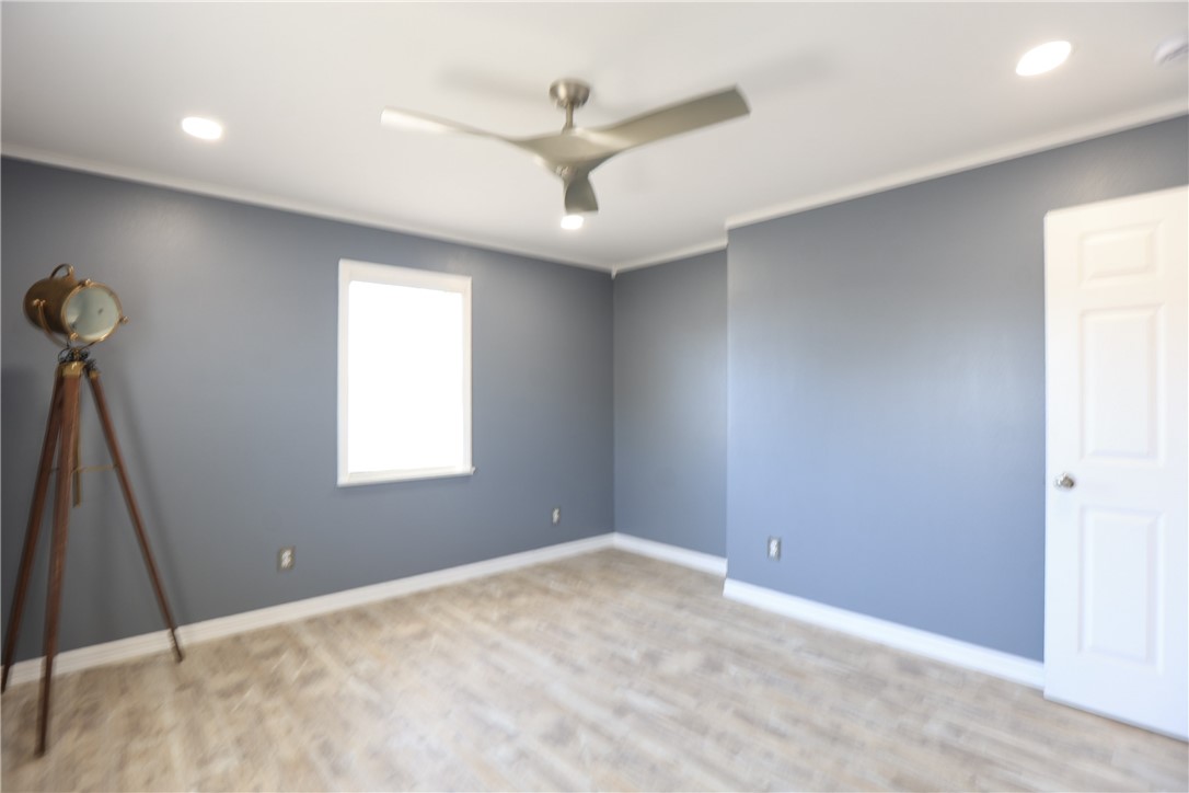 700 North Cameron Street Alice, TX 78332 - Photo 5 of 15 a view of an empty room with a window