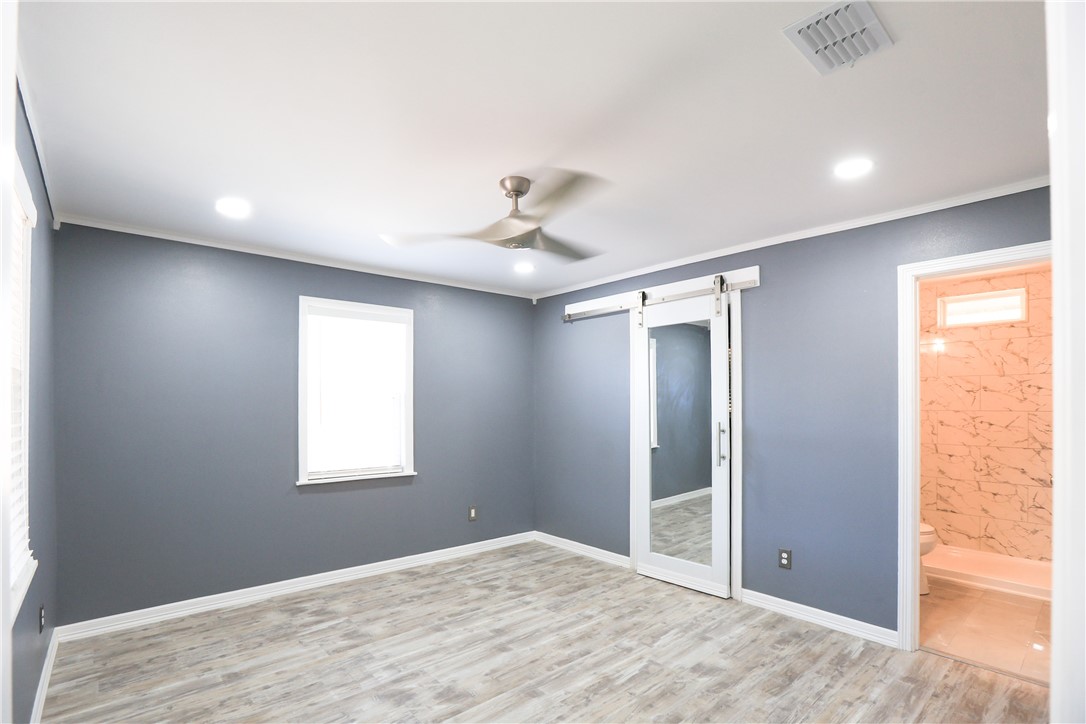700 North Cameron Street Alice, TX 78332 - Photo 7 of 15 a view of an empty room with a window