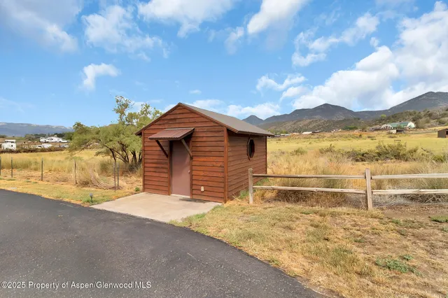 a view of a house with a mountain