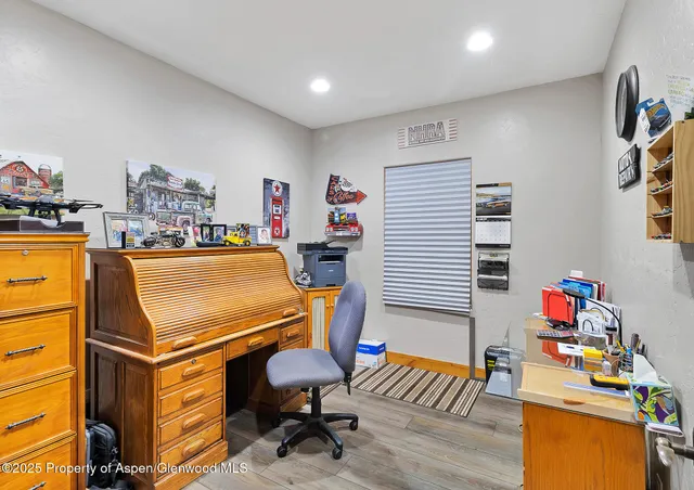 a room with furniture and a wooden floor
