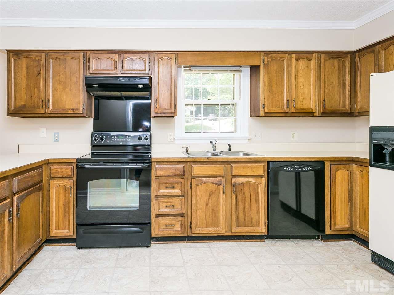 6116 Bayberry Lane Raleigh, NC 27612 - Photo 7 of 25 Newer black appliances