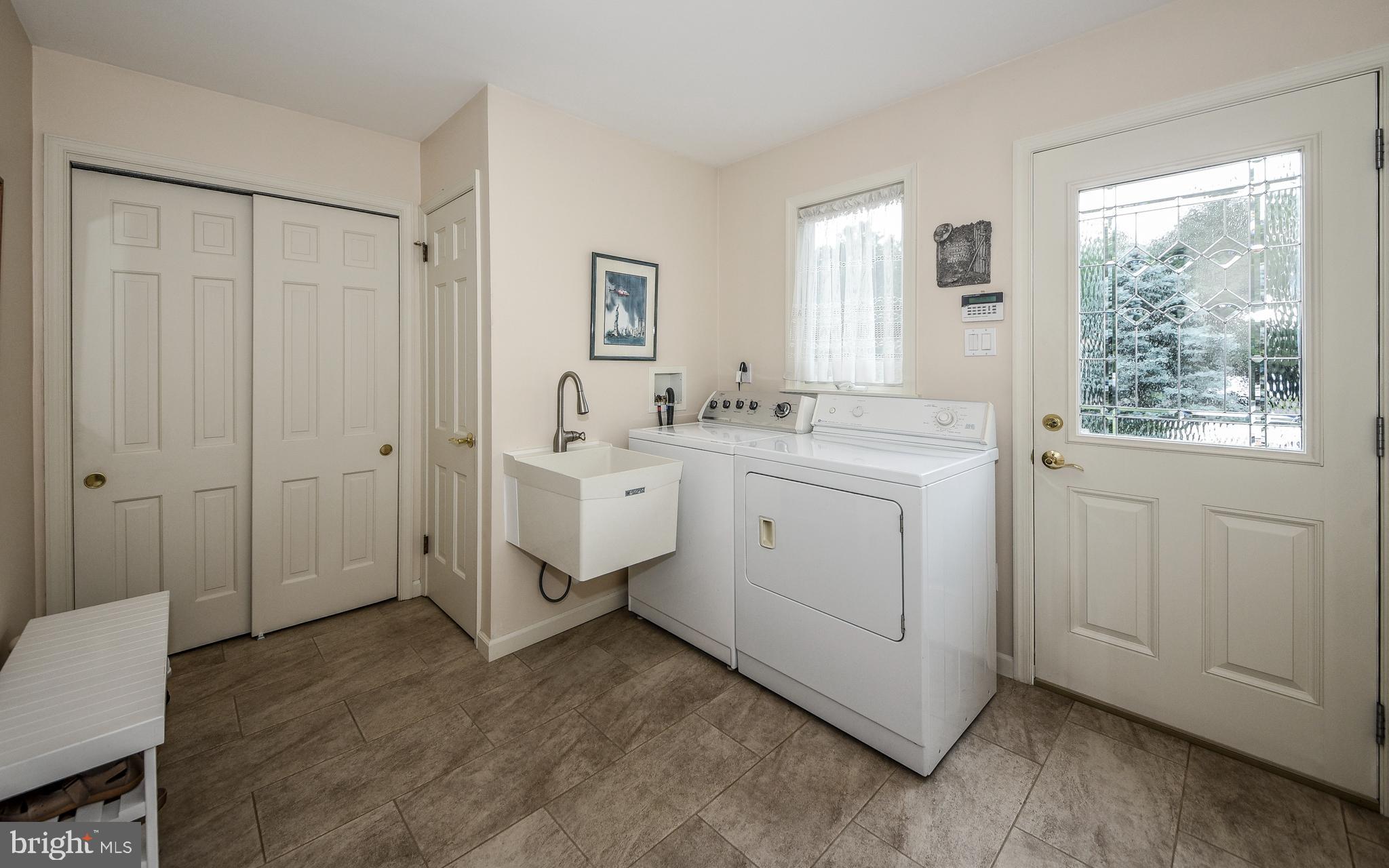 971 Lavera Road Warminster, PA 18974 - Photo 37 of 42 Tiled Floor Laundry Room with Outside Access