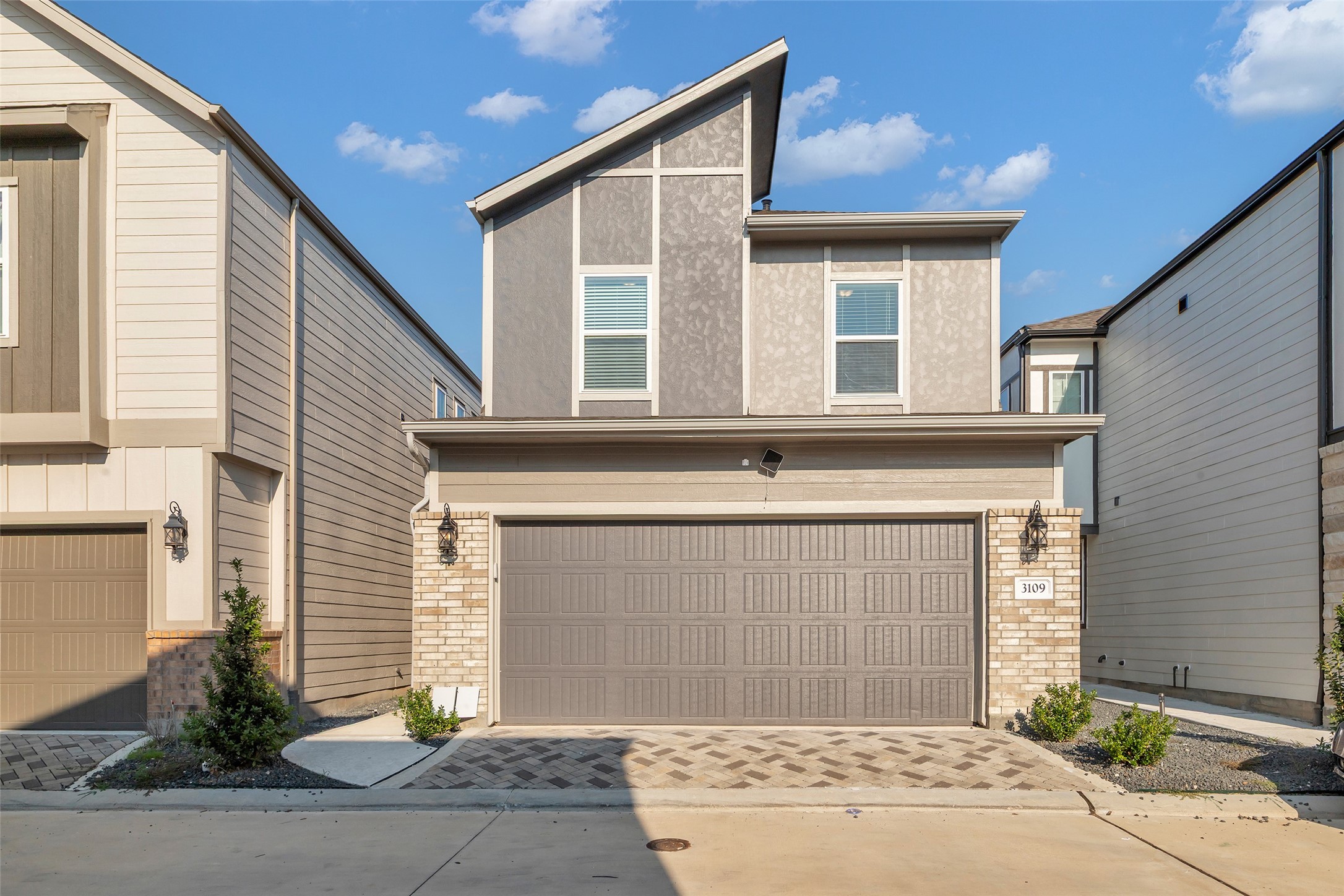 3109 Boulder Rnch Drive Houston, TX 77063 - Photo 1 of 26 a front view of a house