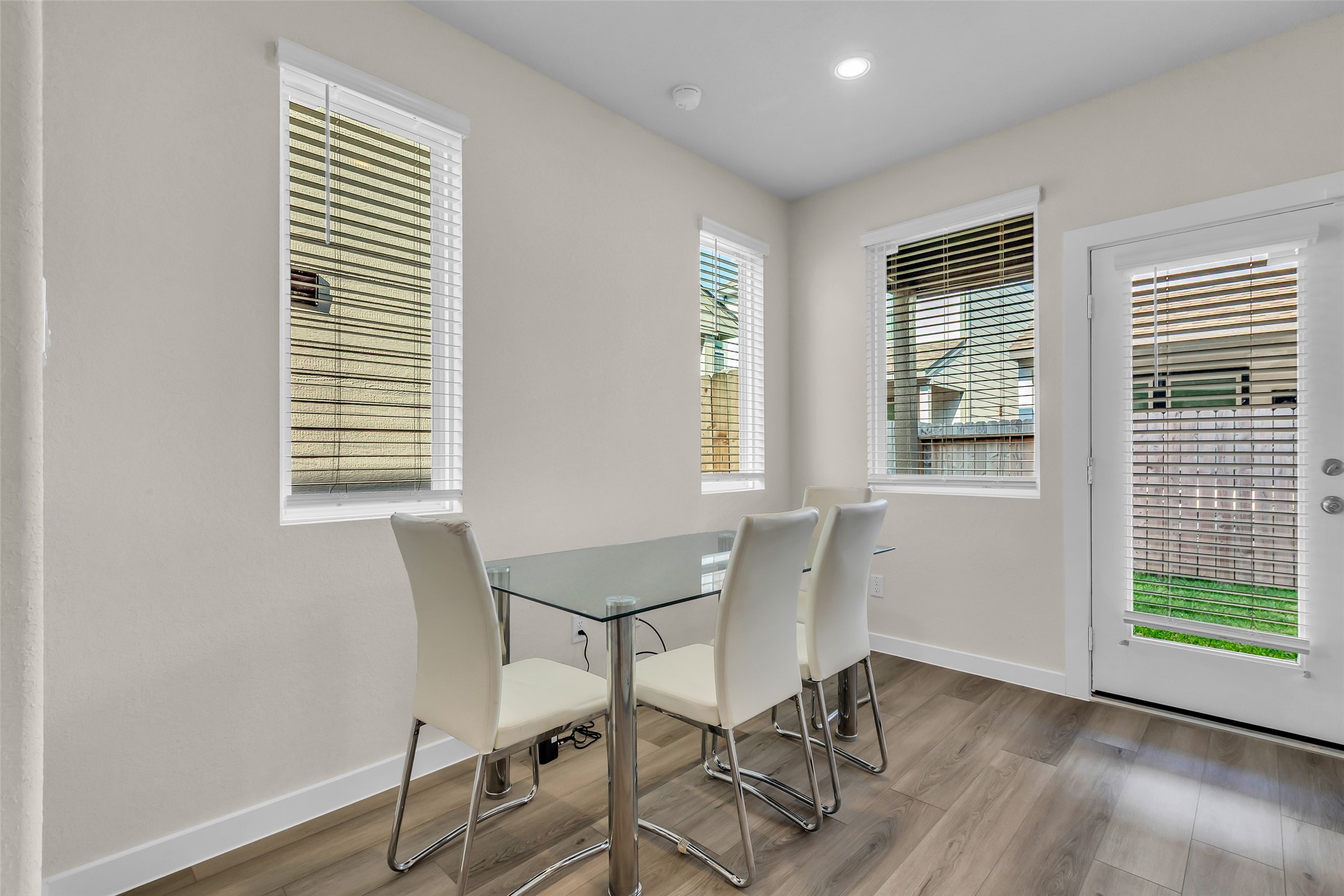 3109 Boulder Rnch Drive Houston, TX 77063 - Photo 16 of 26 a view of a workspace with furniture and a window
