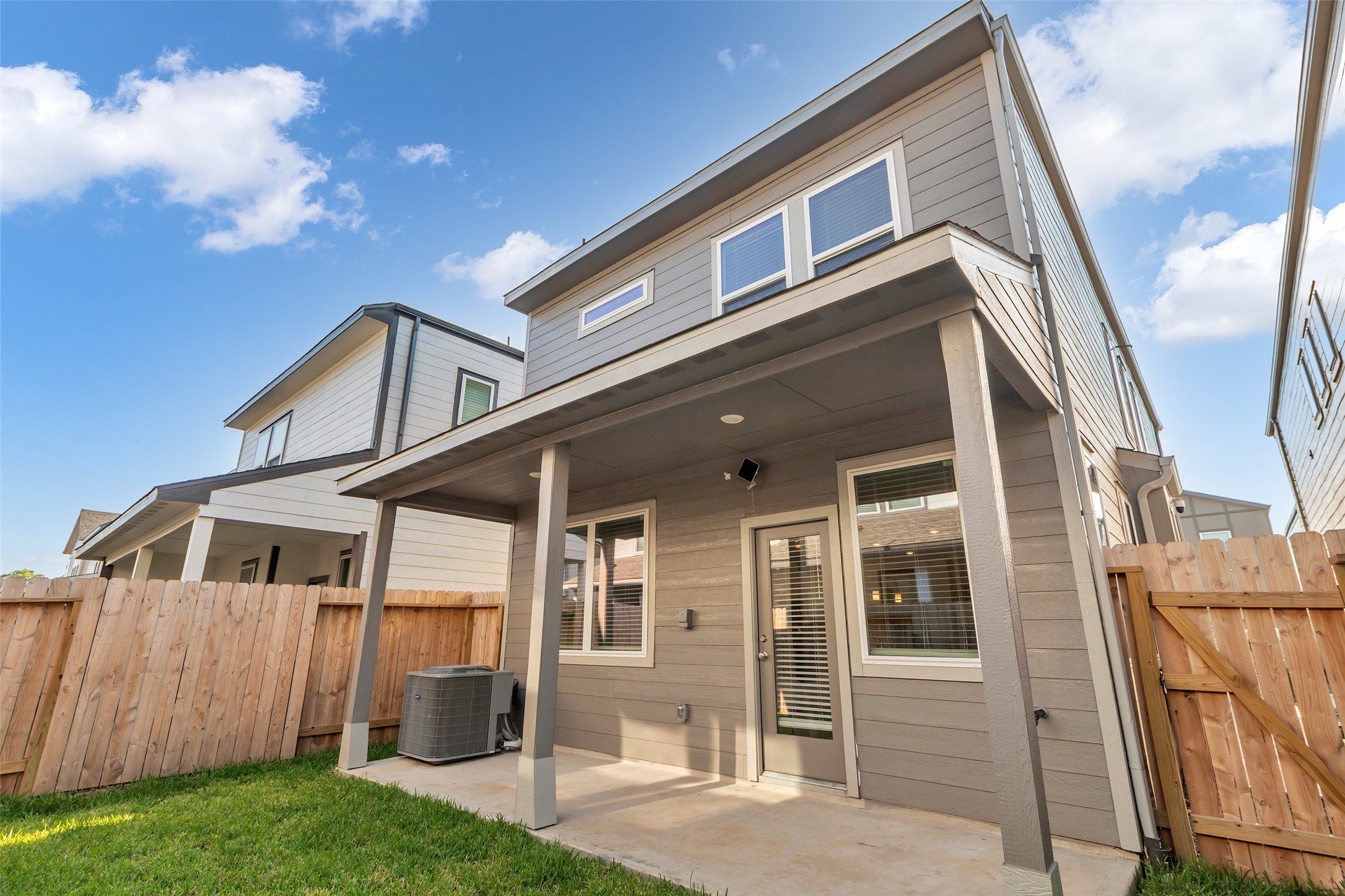 3109 Boulder Rnch Drive Houston, TX 77063 - Photo 25 of 26 a front view of a house with a yard