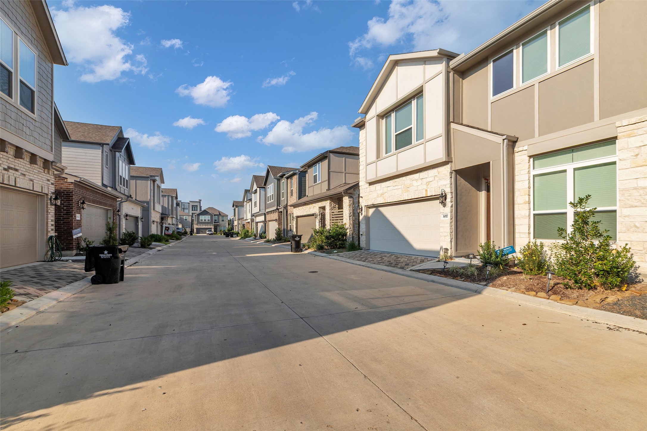 3109 Boulder Rnch Drive Houston, TX 77063 - Photo 3 of 26 a view of a street with cars
