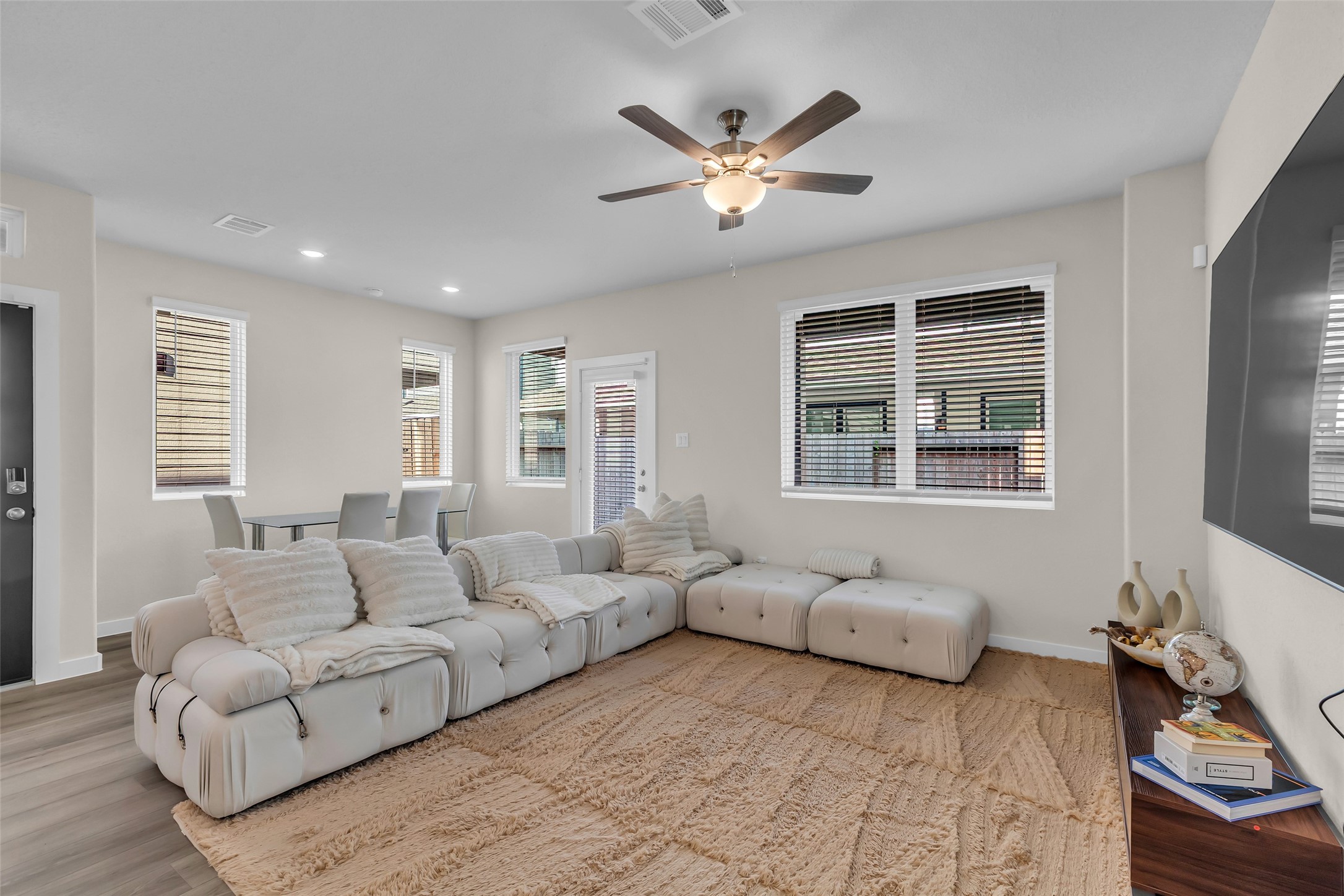3109 Boulder Rnch Drive Houston, TX 77063 - Photo 5 of 26 a living room with furniture and windows