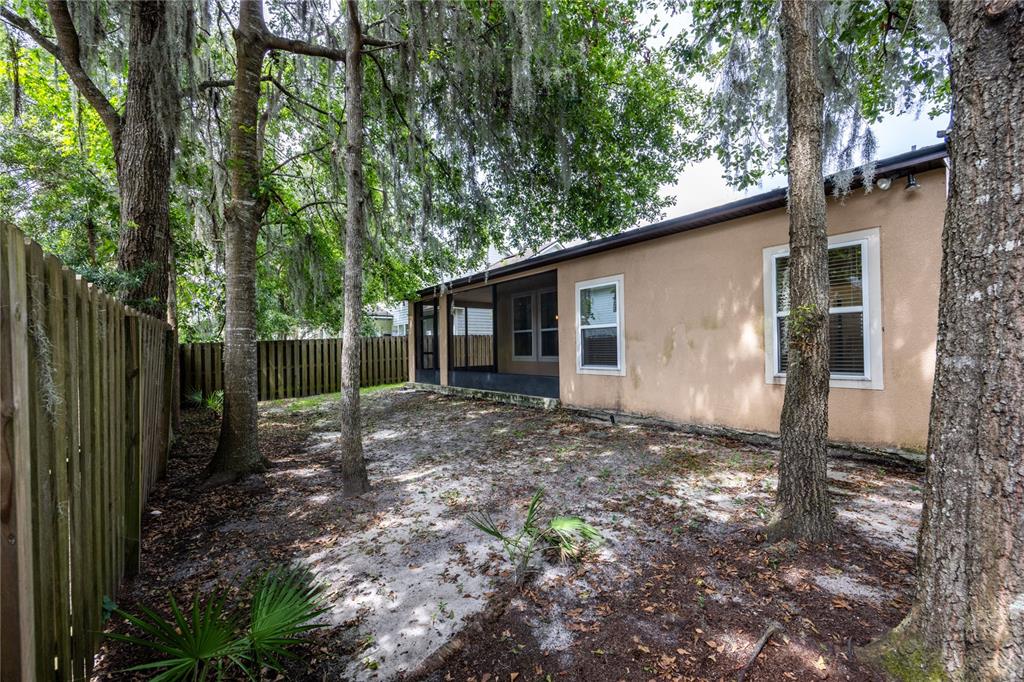 8216 Northwest 54th Street Gainesville, FL 32653 - Photo 56 of 58 a backyard of a house with lots of green space