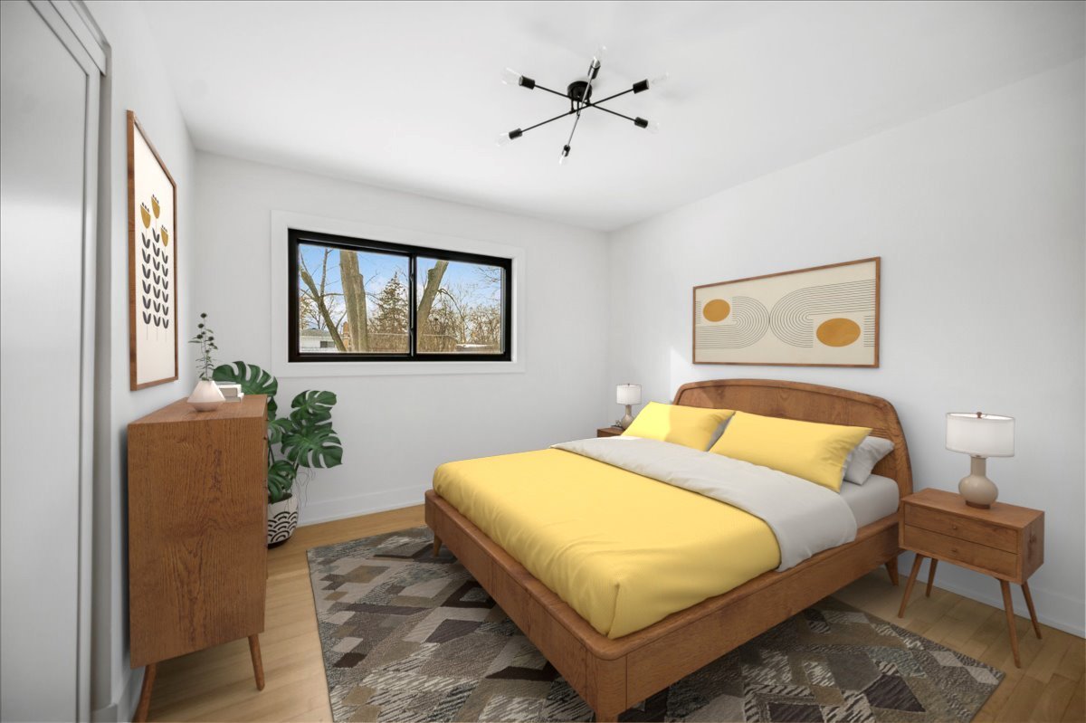 626 Barberry Road Highland Park, IL 60035 - Photo 23 of 38 a bedroom with a bed and a chandelier