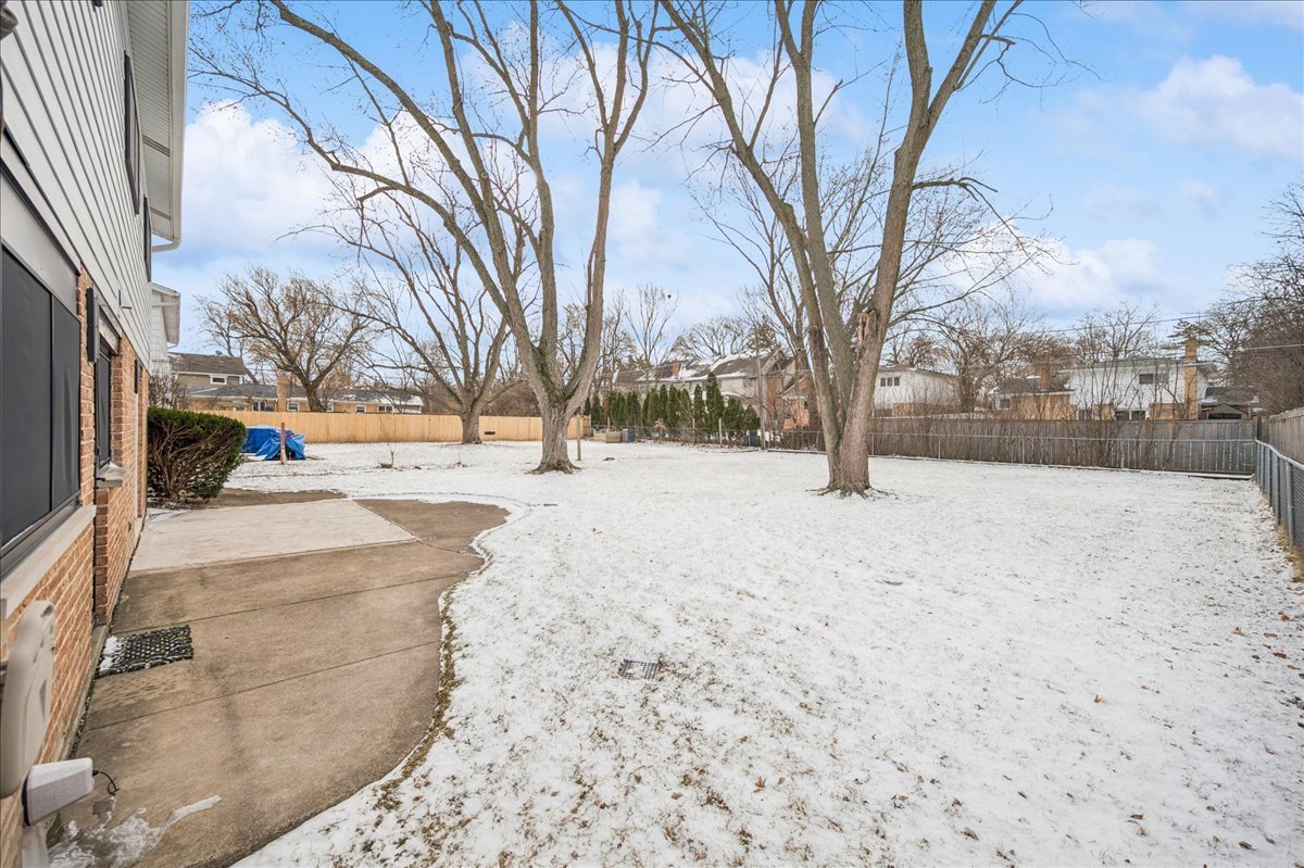 626 Barberry Road Highland Park, IL 60035 - Photo 32 of 38 a street view covered with snow