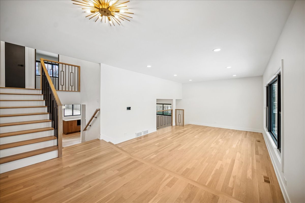 626 Barberry Road Highland Park, IL 60035 - Photo 5 of 38 a view of a livingroom with a furniture wooden floor and staircase