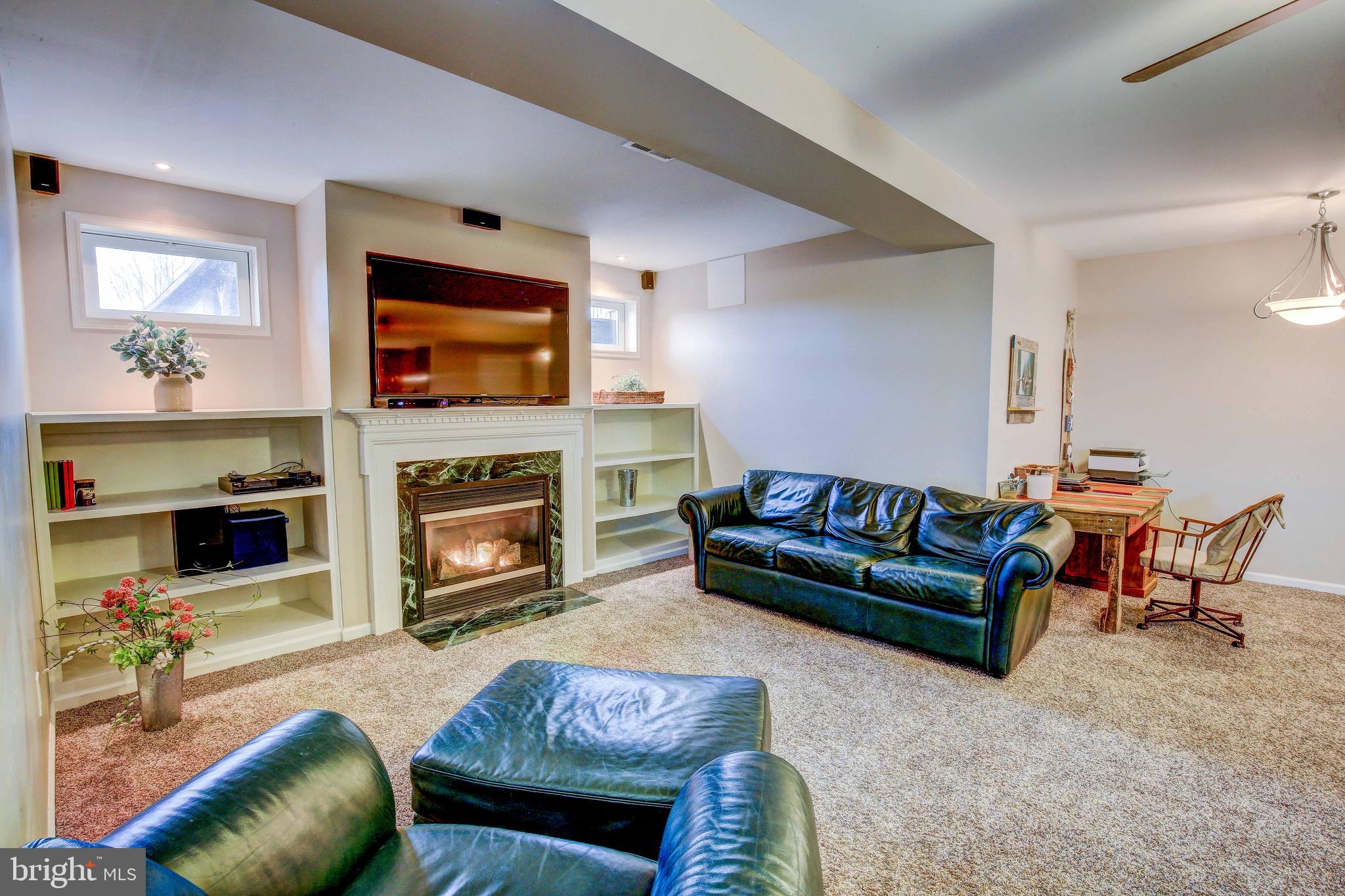 6160 Scaggs Road Owings, MD 20736 - Photo 51 of 71 Larger Entertainment Area, Behind This is Storage