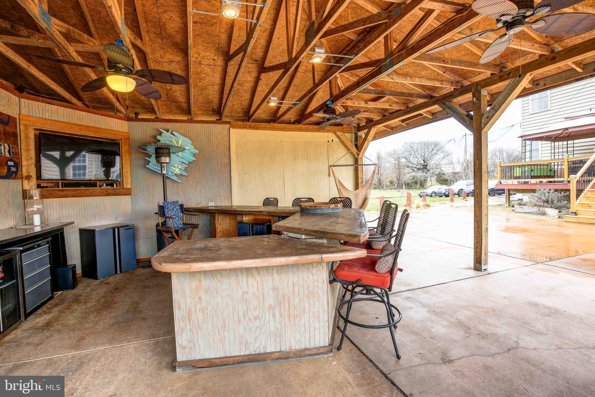 6160 Scaggs Road Owings, MD 20736 - Photo 56 of 71 Outdoor Dry Bar with Three Large Ceiling Fans