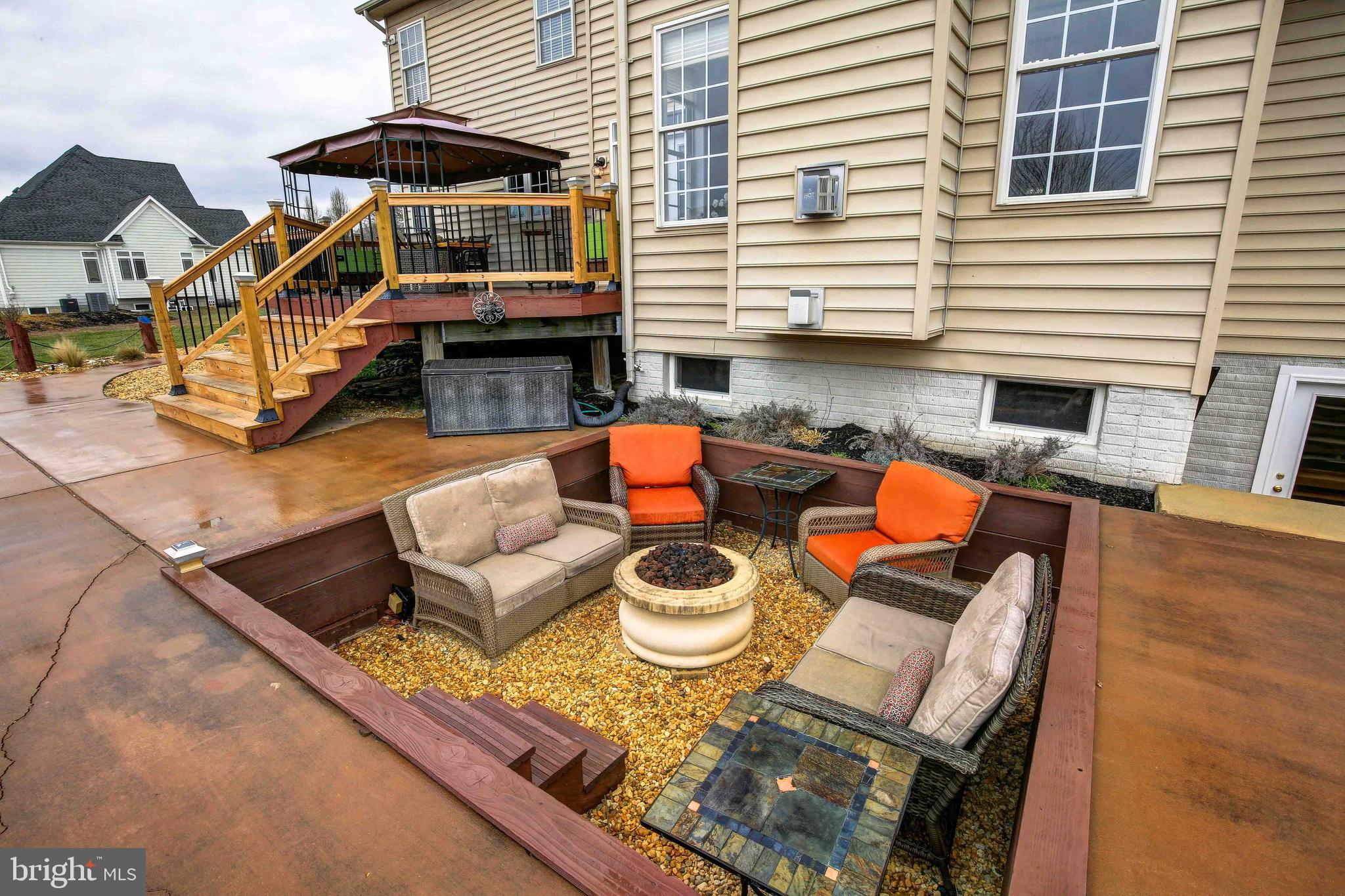 6160 Scaggs Road Owings, MD 20736 - Photo 59 of 71 Sunken Fire Pit Seating Area