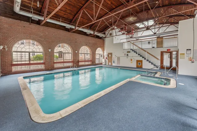 a view of a swimming pool with window