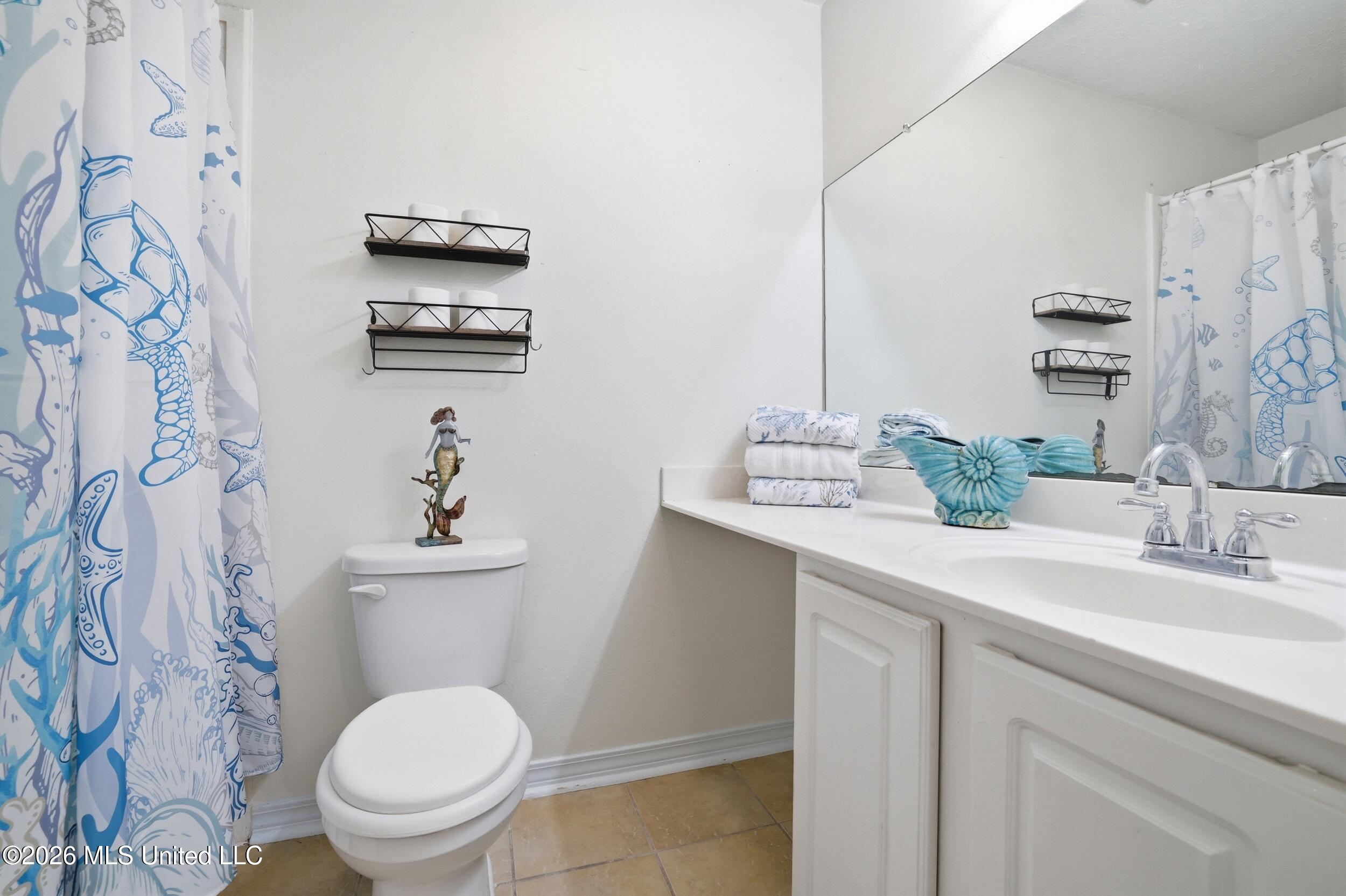 1550 East 2nd Street, Unit R105 Pass Christian, MS 39571 - Photo 16 of 36 19_r6__4868