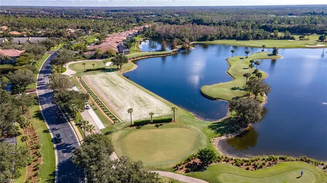 an aerial view of a house with swimming pool