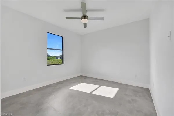 an empty room with window