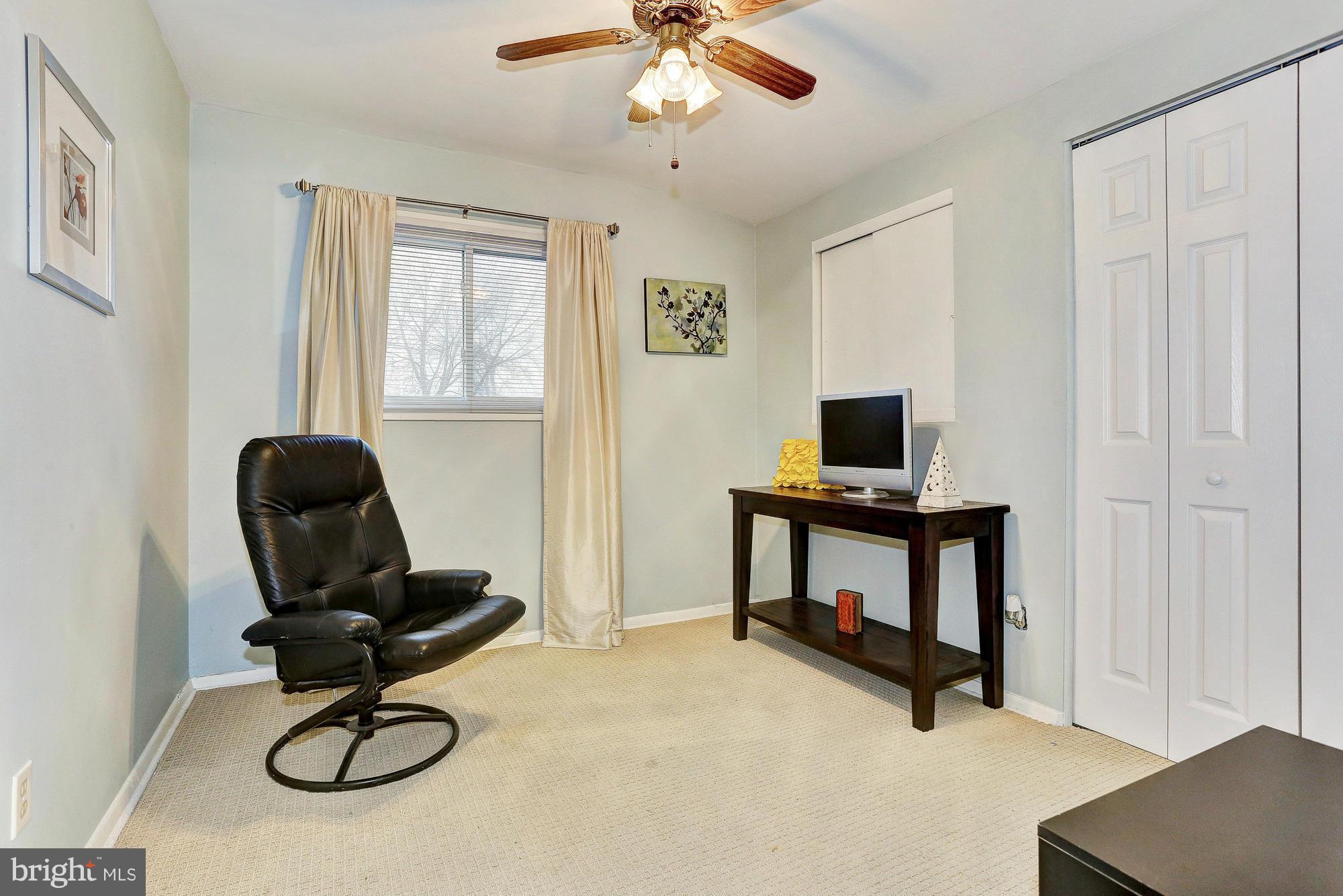 3303 Greenmead Road Windsor Mill, MD 21244 - Photo 18 of 20 a living room with furniture and a window