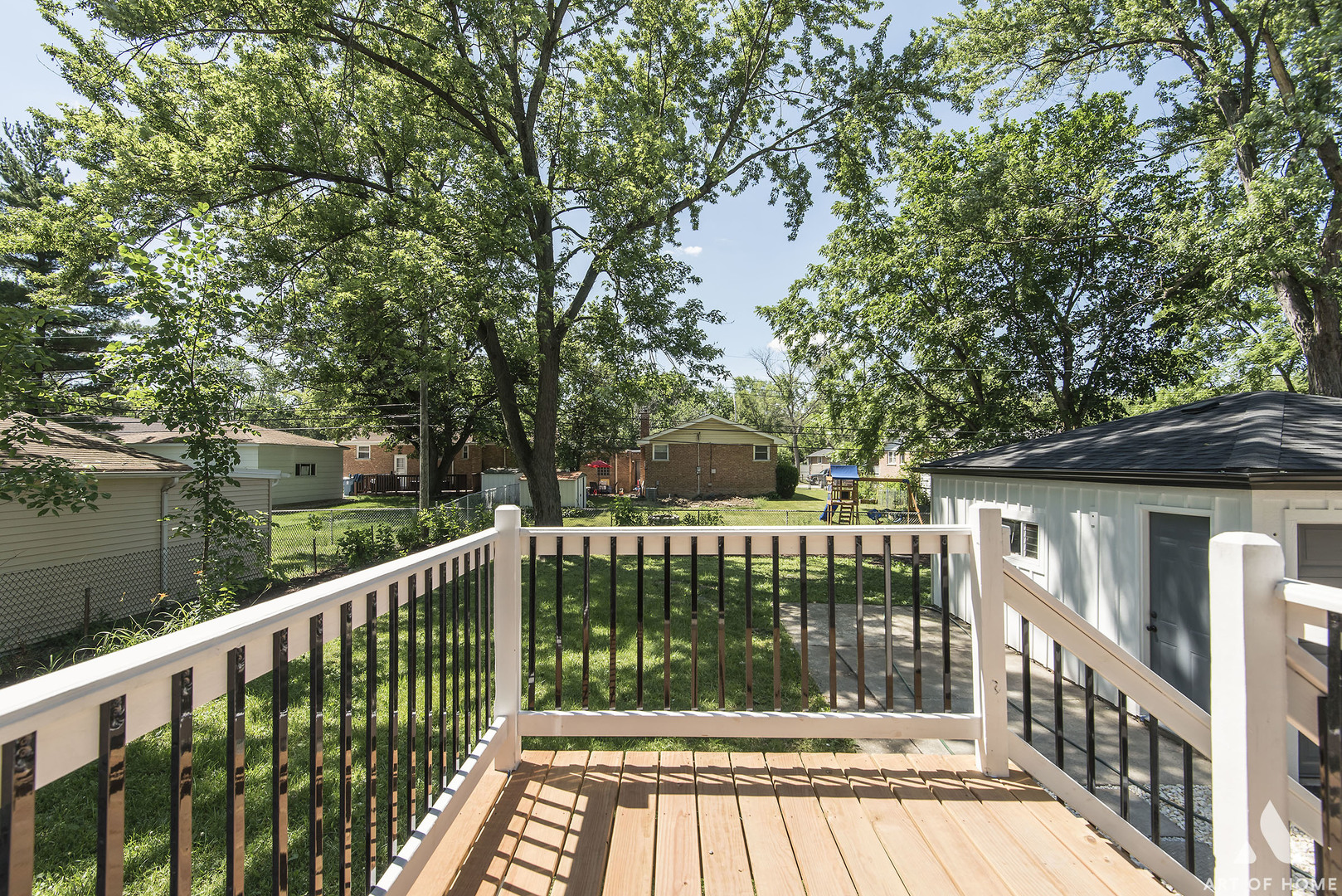 270 Holbrook Road Chicago Heights, IL 60411 - Photo 28 of 33 a view of a wooden deck and a forest