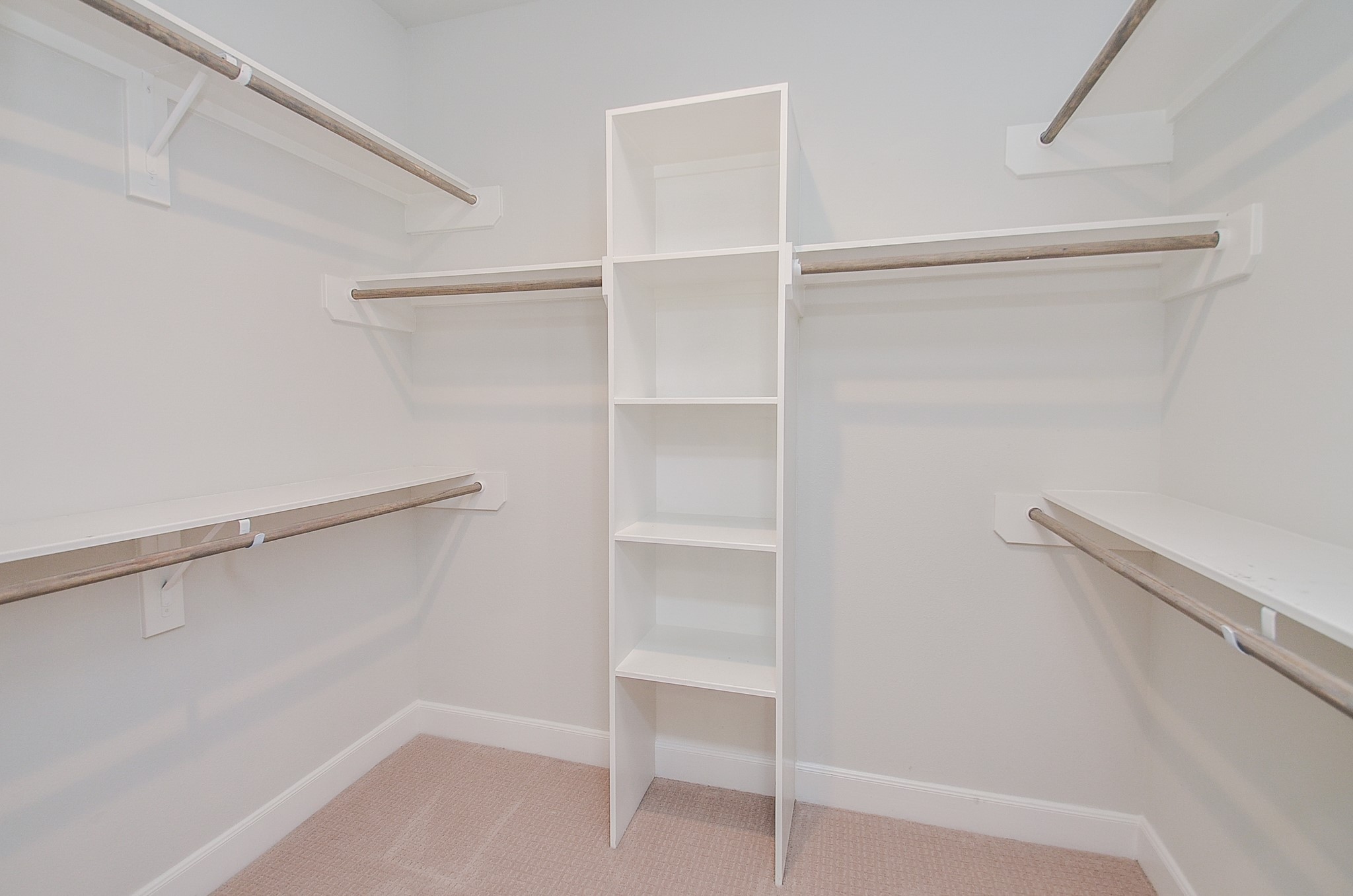 9577 Neuens Road, Unit F Houston, TX 77080 - Photo 19 of 26 a view of an empty walk in closet