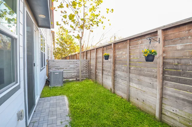 a view of a back yard of the house
