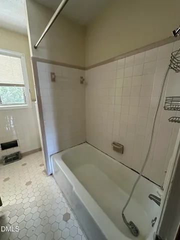 a bathroom with a bathtub