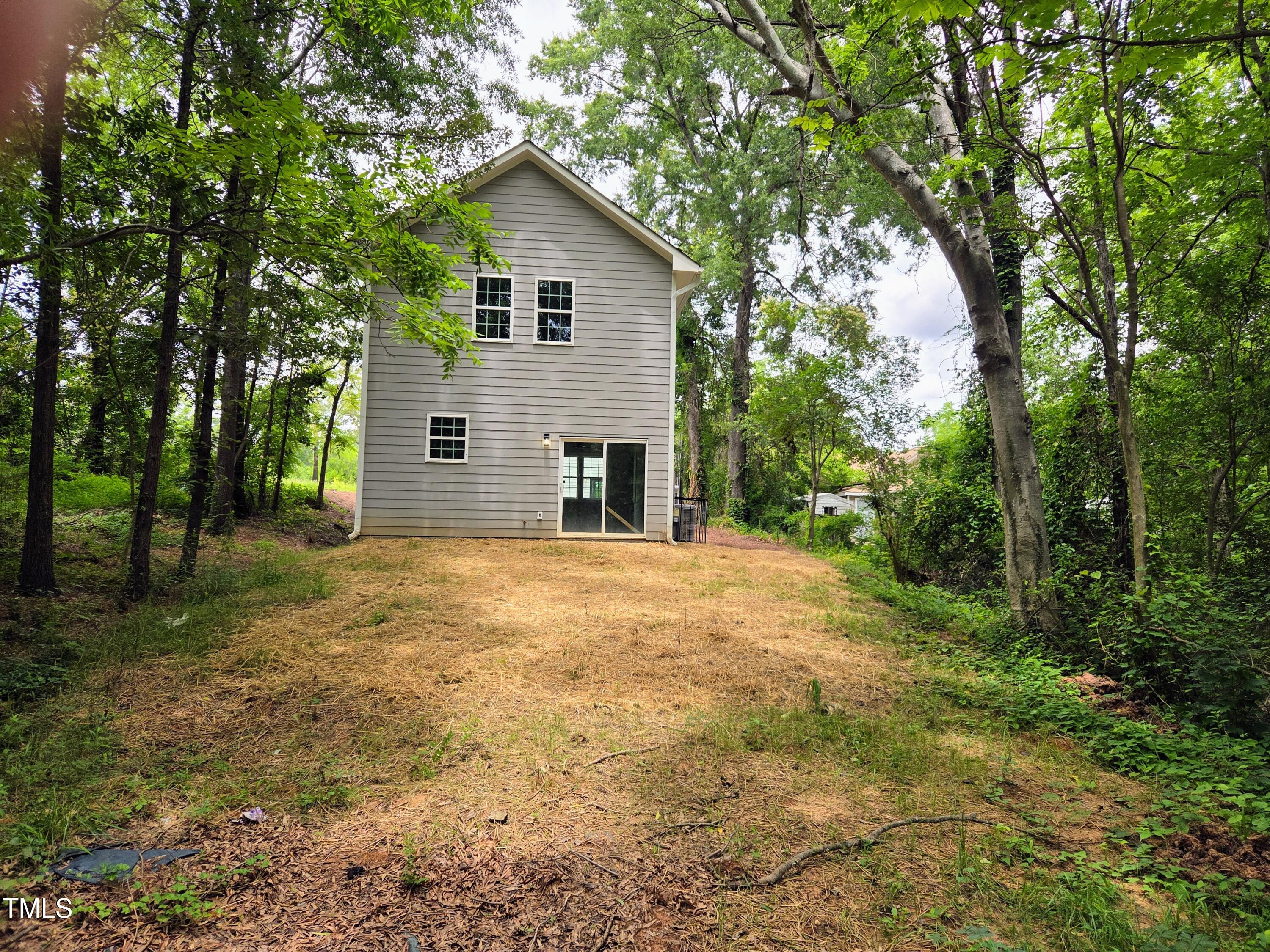 608 East Umstead Street Durham, NC 27701 - Photo 20 of 20 a view of a house with yard and a tree